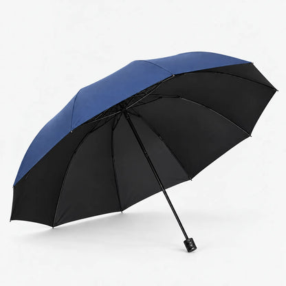 Open navy blue umbrella seen from below at an angle, showing the black underside lining and ribs on a white background. 2