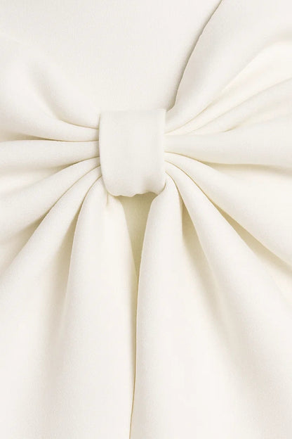 Close-up of the soft gathered bow in cream fabric, tied with a narrow centre loop 2