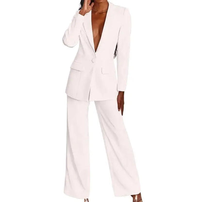 Model in a white one-button blazer and wide-leg trousers against a plain white background, front view 1