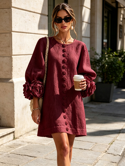 Burgundy dress worn on a sunny street, with sunglasses, a braided shoulder bag and a takeaway coffee. 38