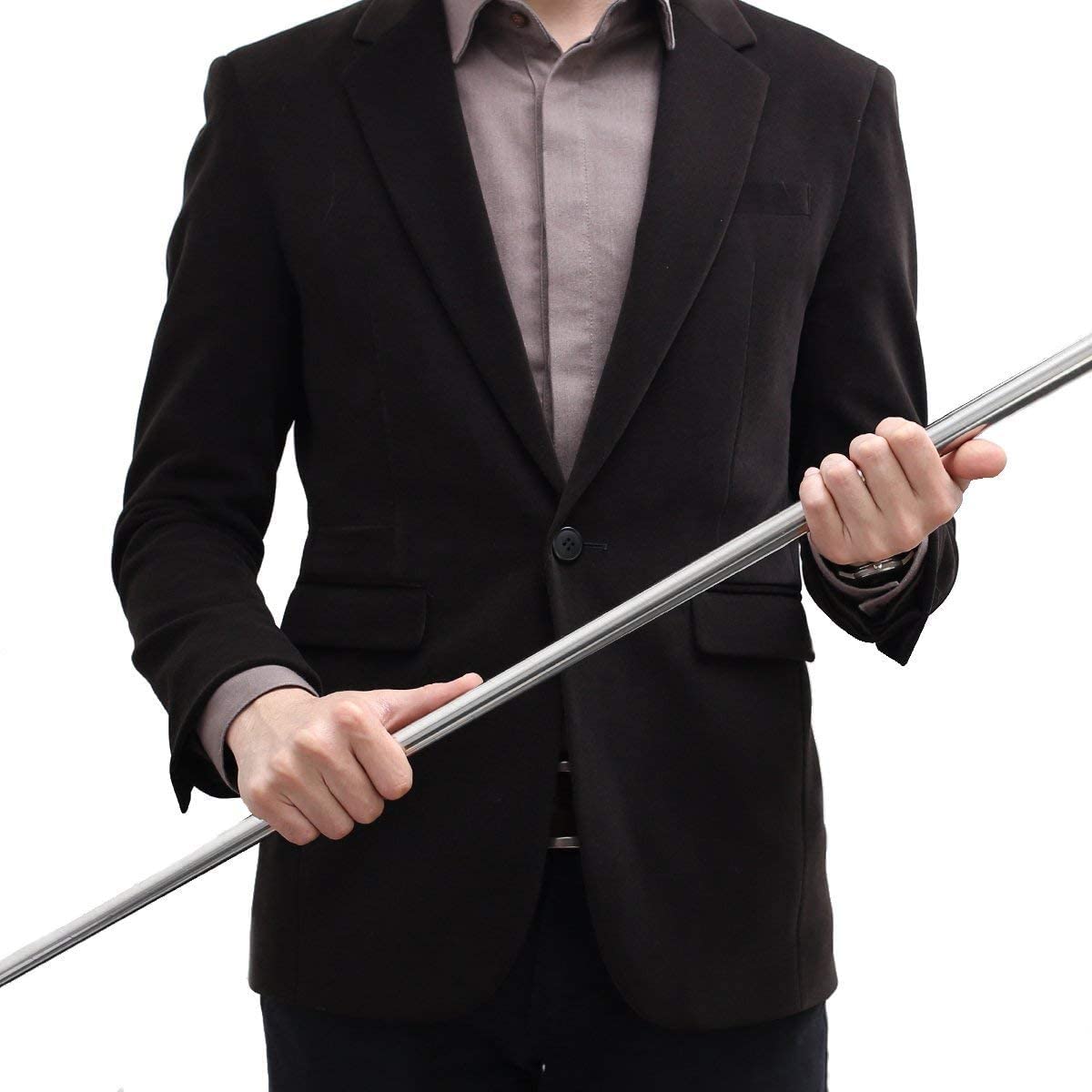 Man in a dark blazer holding the extended silver wand horizontally across his body with both hands 4