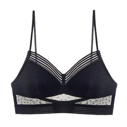 Flat lay of the black bra showing thin straps, striped V-neckline, dotted mesh details and sheer panels above the striped band. 8