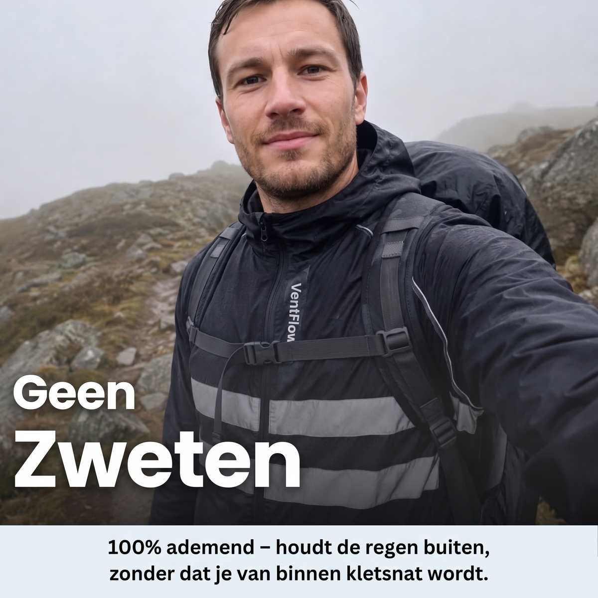 Hiker taking a selfie on a misty rocky hillside, wearing the black jacket with reflective stripes under a rucksack. 9