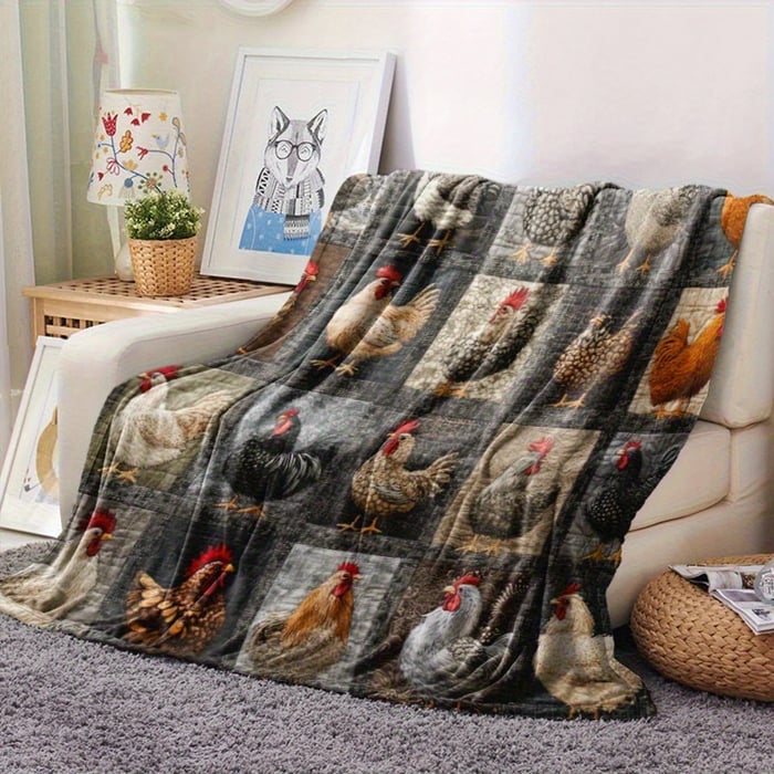 Realistic chicken-print blanket spread over a cream sofa beside a lamp, framed picture and rug 14