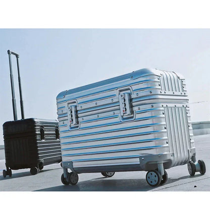 Silver ribbed case in the foreground with a black one behind, outdoors under a pale sky 6