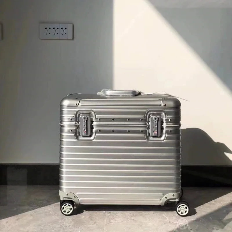 Front view of the silver ribbed case with twin locks, standing in a sunlit room 8