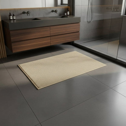 Beige textured mat on dark grey tiles in front of a walnut vanity and glass shower 2