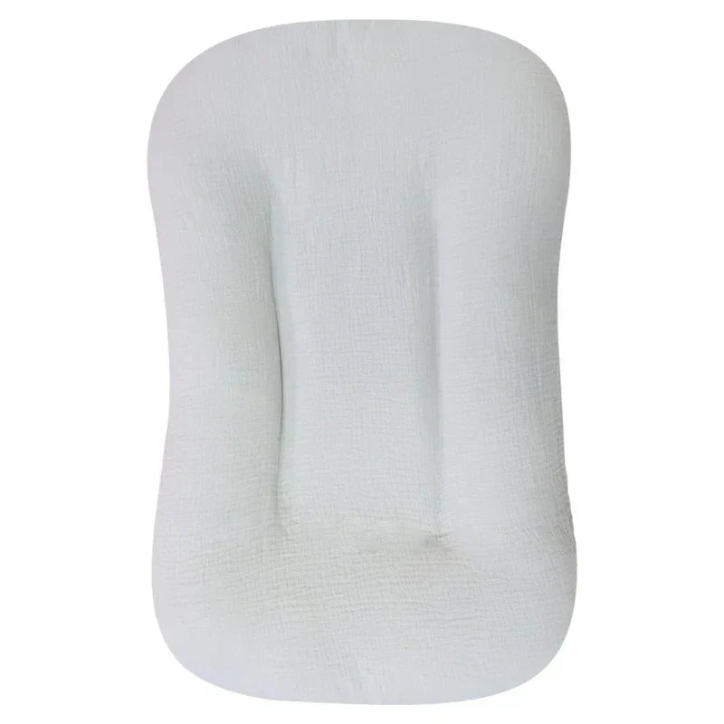 Empty light grey lounger with a raised rim and softly crinkled fabric 10