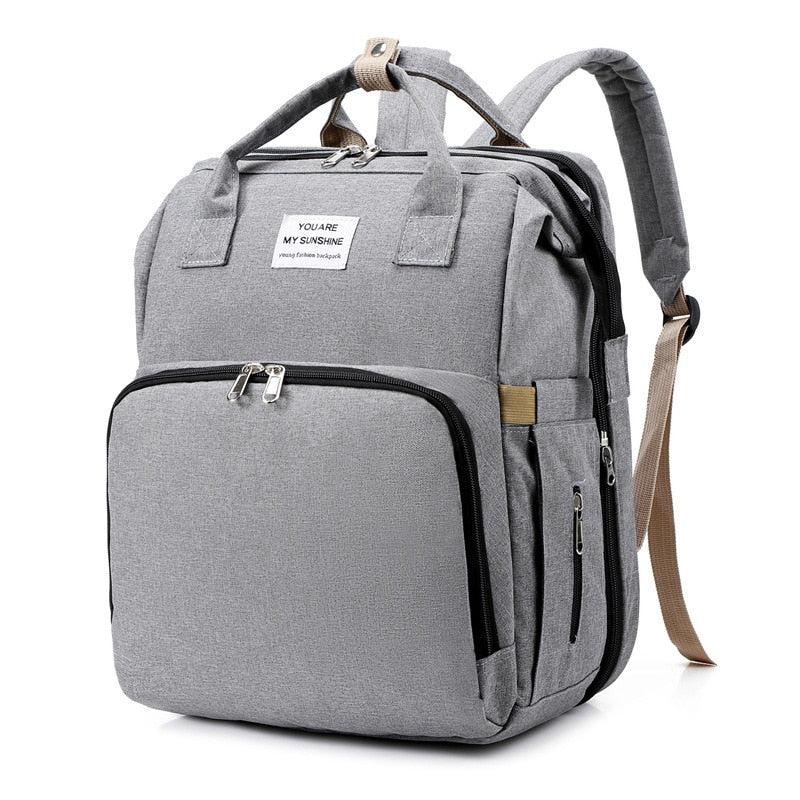 Portable baby cot and changing bag – multifunctional travel rucksack