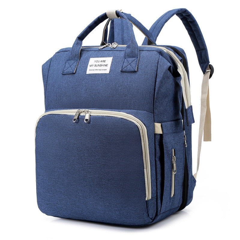 Portable baby cot and changing bag – multifunctional travel rucksack