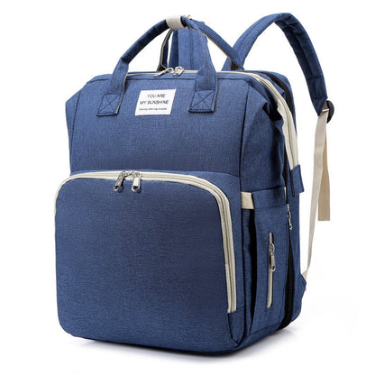 Portable baby cot and changing bag – multifunctional travel rucksack