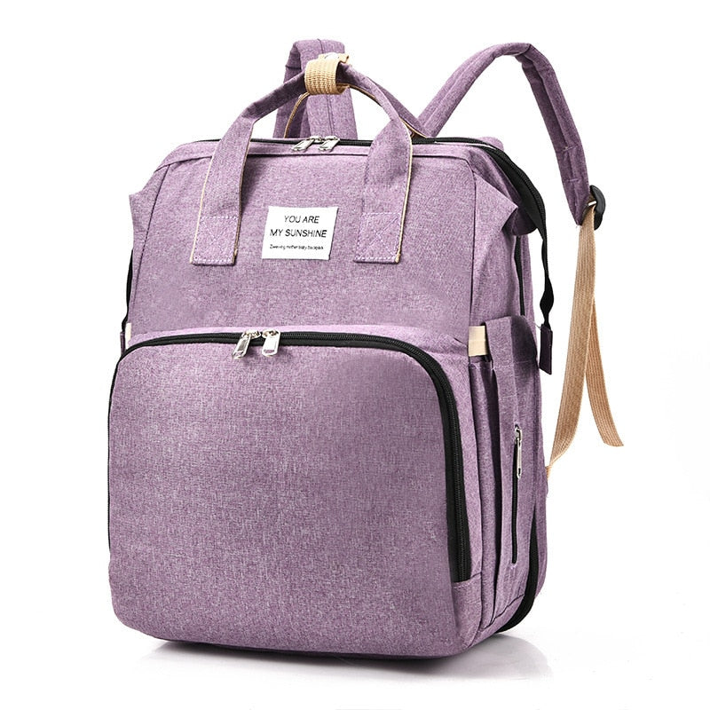 Portable baby cot and changing bag – multifunctional travel rucksack
