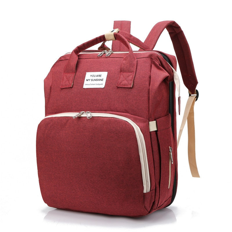 Portable baby cot and changing bag – multifunctional travel rucksack