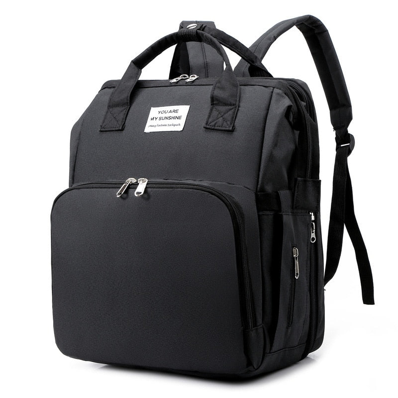 Portable baby cot and changing bag – multifunctional travel rucksack
