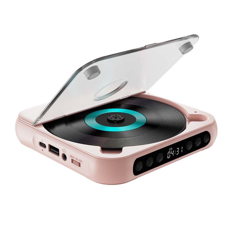 Pink player with lid raised on a white background, showing a turquoise disc ring and the ports on its side. 14