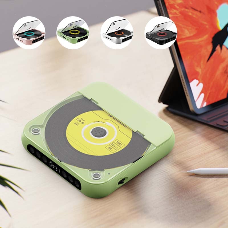 Green player with a yellow disc on a desk beside a tablet, with small insets showing the four colour options. 6