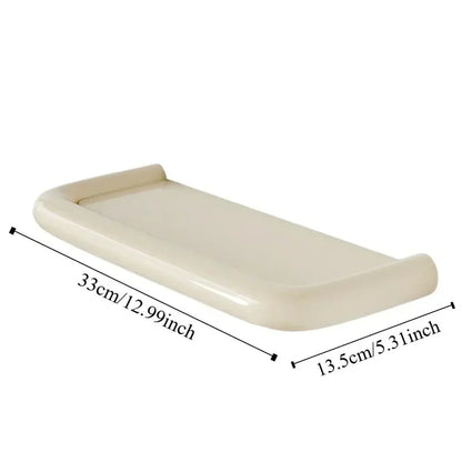 Single cream shelf with rounded raised edges, shown with length and depth measurement lines 8