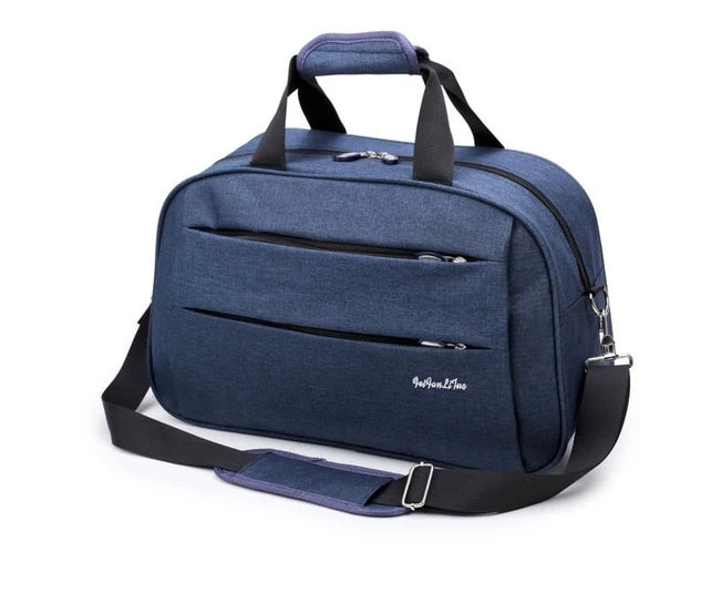 Reversible hand luggage bag