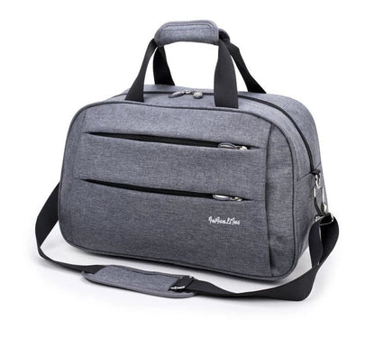 Reversible hand luggage bag