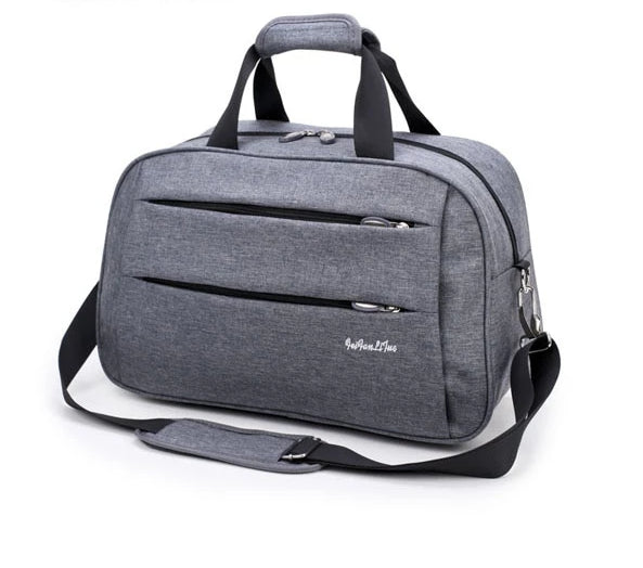 Reversible hand luggage bag