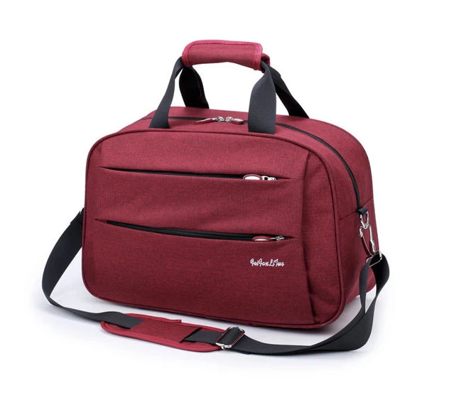 Reversible hand luggage bag