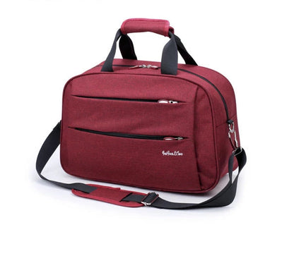 Reversible hand luggage bag
