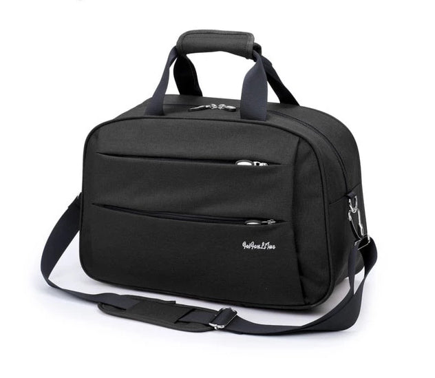 Reversible hand luggage bag