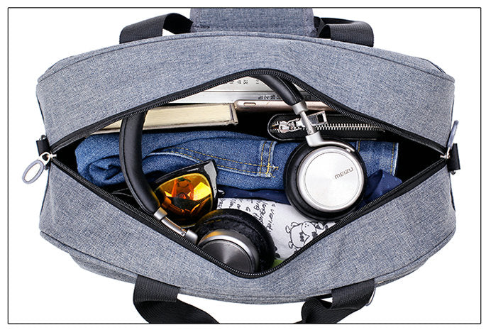 Reversible hand luggage bag