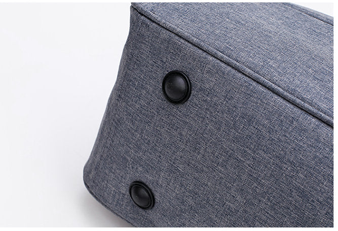 Reversible hand luggage bag