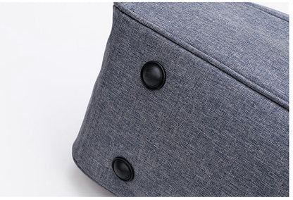Reversible hand luggage bag