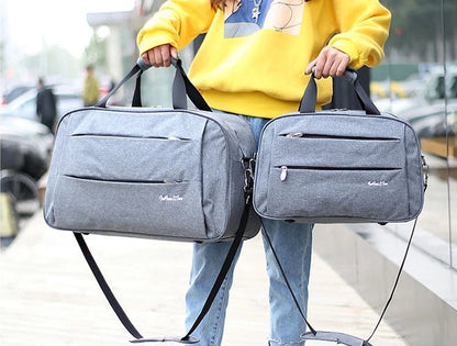 Reversible hand luggage bag