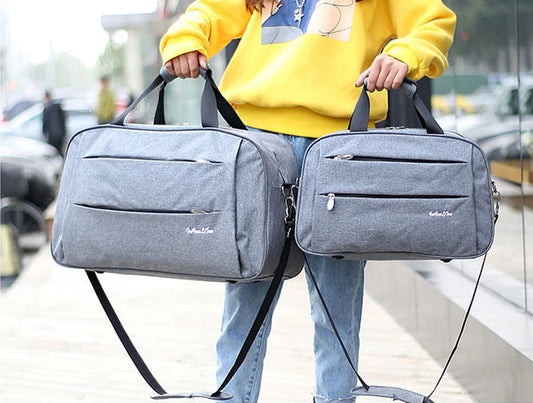 Reversible hand luggage bag