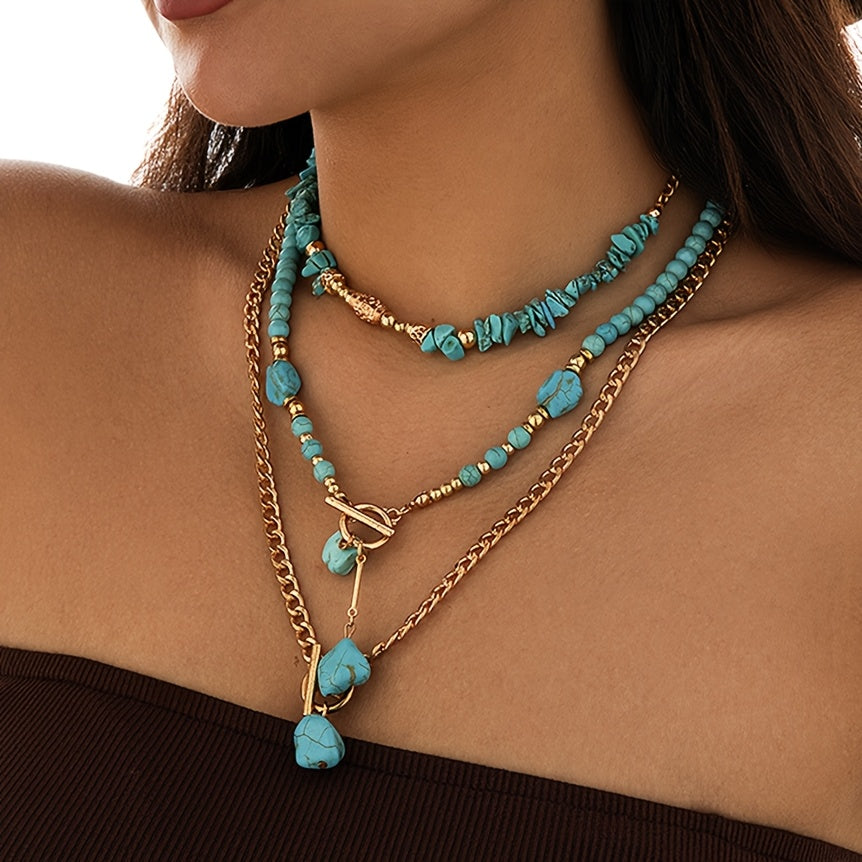 Model wearing the three-strand necklaces at an angle, showing the chip choker above the longer toggle pendants 2