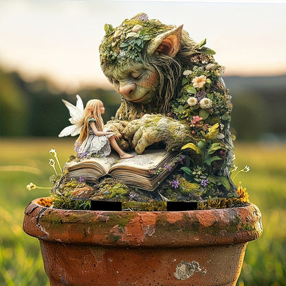 Troll and fairy with an open book, stuck into a weathered terracotta pot with a soft meadow behind. 11
