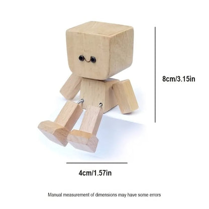 Wooden figure with a small smiling face against white, with lines showing its height of 8cm and width of 4cm. 2