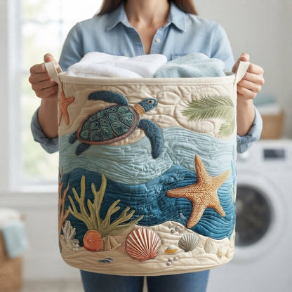 Person in a blue shirt holding the full basket by its two canvas handles, showing the turtle and starfish design on the front. 5