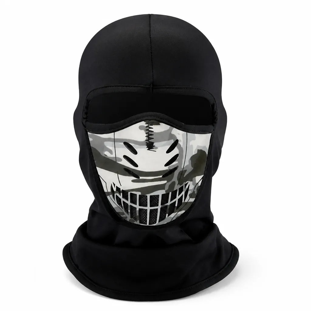 Front view of the black balaclava on a white background, showing the camouflage face panel with oval vents and mesh grille. 6