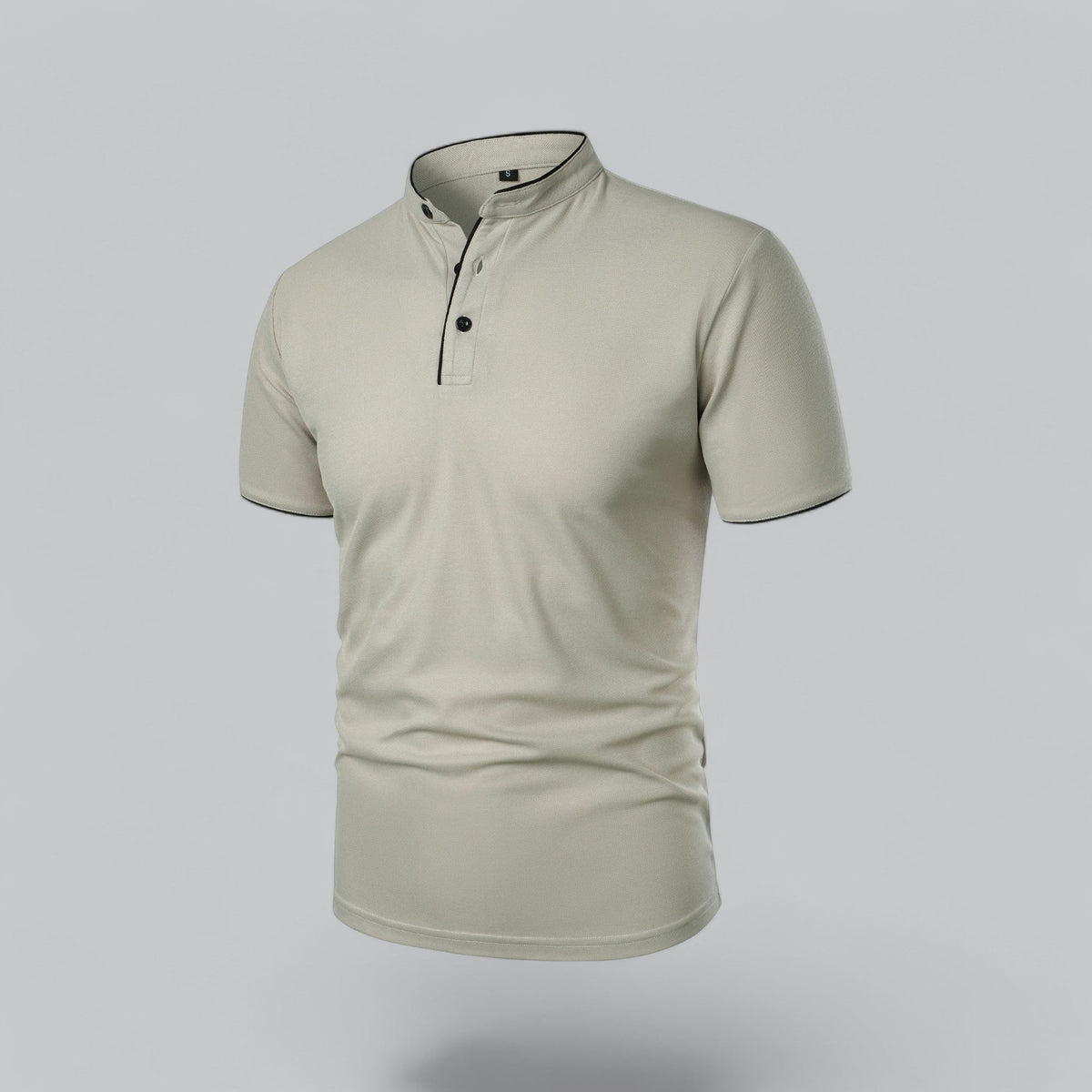 Angled three-quarter view of the pale stone polo showing the buttoned placket and black piping 13
