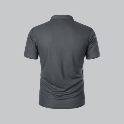 Back view of the dark grey polo, plain back with stand-up neckband and black sleeve edging 14