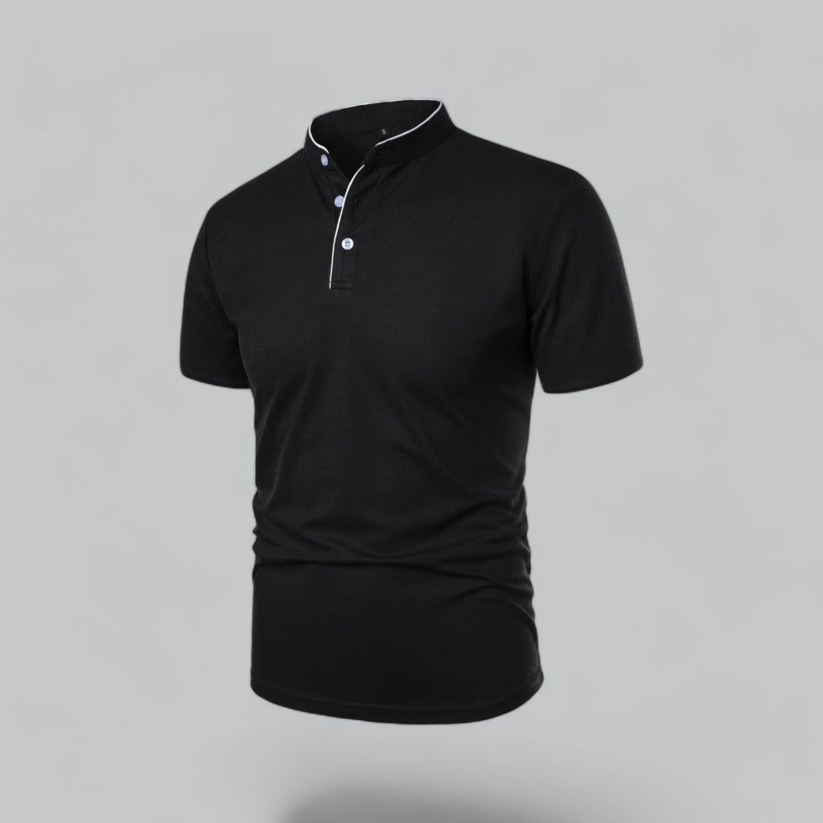 Angled three-quarter view of the black polo showing white piping and pale buttons on the placket 17