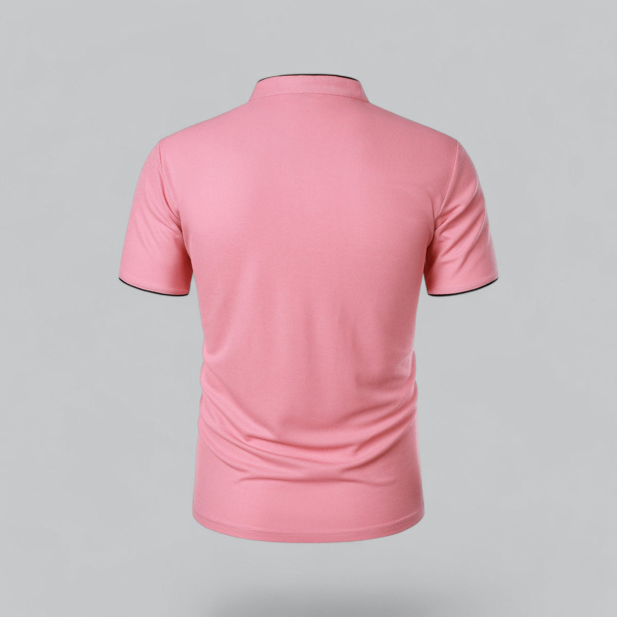 Back view of the pink short-sleeved polo, showing the plain back, stand-up neckband and black-edged sleeve hems 22