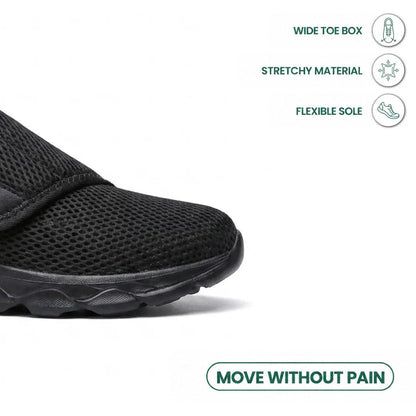 Close-up of the black shoe's wide toe box and sole, with icons for stretchy material and flexible sole. 14