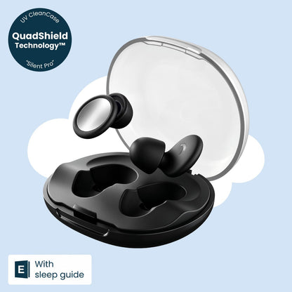 Pair of black sleep earplugs with silver round faces beside an open clear-lidded black charging case, on a pale blue cloud backdrop. 1