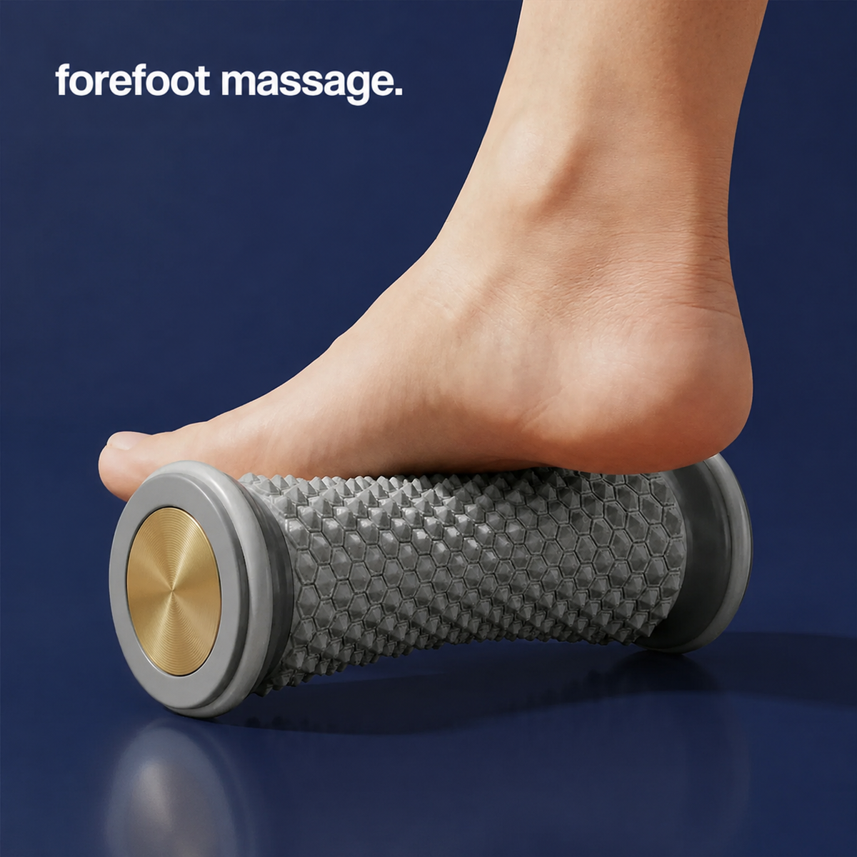Ball of a bare foot pressing down on the roller's hexagonal studded surface 4