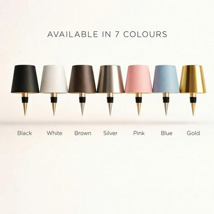 Row of seven lamp shades on stoppers, in black, white, brown, silver, pink, blue and gold 3
