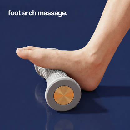 Bare foot resting its arch on the studded roller, shown from the end cap 2