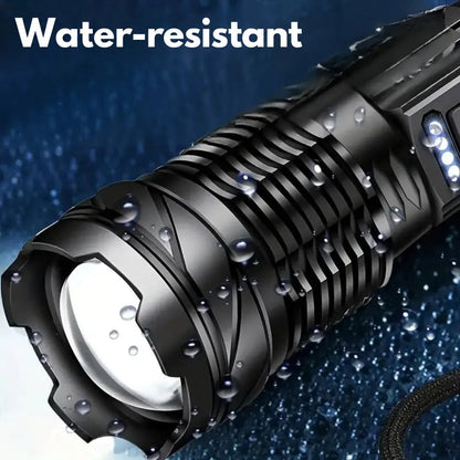 Close-up of the torch's lens end covered in water droplets, showing it is splash resistant 3