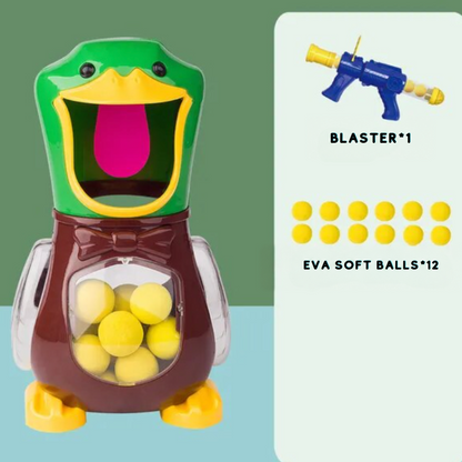 Duck target with a bow tie shown beside one popper and twelve foam balls 7