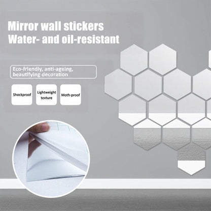 Hexagonal mirror stickers on a grey wall, with an inset of a hand peeling the backing from a sheet. 4