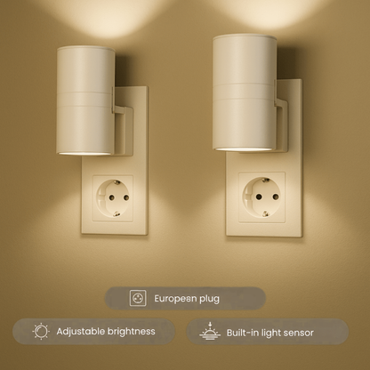 Two white cylindrical plug-in lights in wall sockets, glowing warmly upwards and downwards 2
